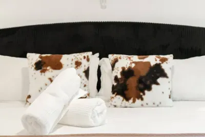 The second bedroom offers a fun and funky western vibe with colorful southwestern decor, and playful accents that will delight guests of all ages