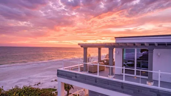 Soak in breathtaking sunset views from your private beachfront balcony, where vibrant skies meet endless ocean horizons. Unwind with a glass of wine, feel the coastal breeze, and experience pure serenity in this unforgettable seaside escape!