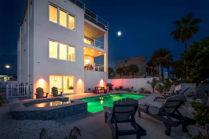 This stunning property glows at night, with outdoor spaces perfect for entertaining, relaxing, and creating unforgettable memories.