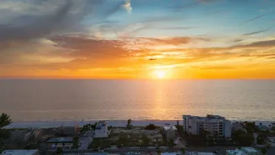Breathtaking skies meet endless waters — capture postcard-worthy sunsets every evening from the comfort of your home.