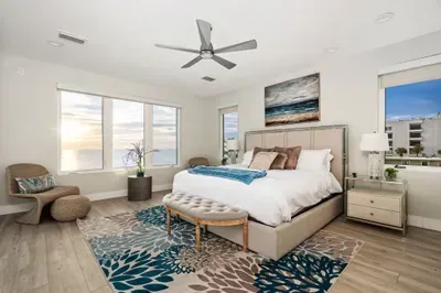 Wake up to endless ocean views right from your bed in this airy master suite — a true retreat for rest and rejuvenation.