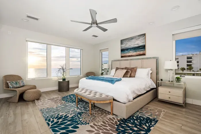 Wake up to endless ocean views right from your bed in this airy master suite — a true retreat for rest and rejuvenation.