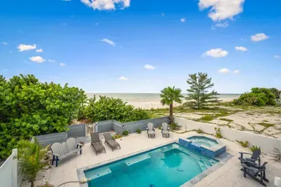 Relax in your private oasis with a sparkling pool, spa, and stunning ocean views just beyond the palms. Lounge poolside, dine al fresco, and soak in coastal breezes.