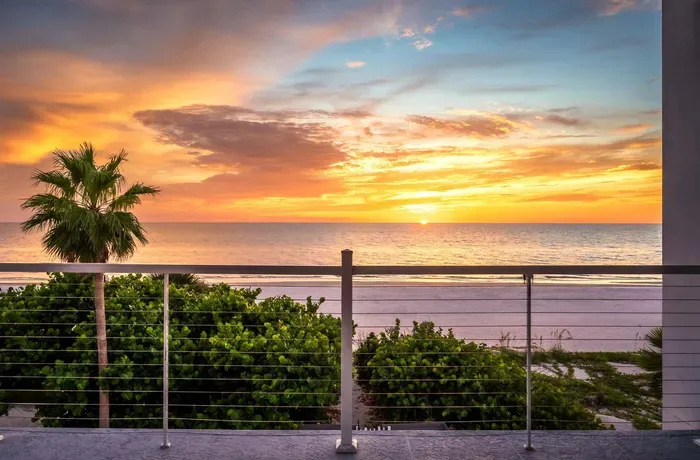 Step onto the balcony for front-row views of Florida’s famous sunsets. A perfect setting for golden hour drinks or quiet evening reflection.
