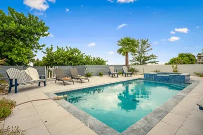 Dive into your private pool surrounded by palm trees and ocean breezes — a refreshing retreat for guests of all ages.