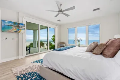 Enjoy direct balcony access and sweeping vistas from this bright, comfortable bedroom — perfect for mornings filled with sunshine.