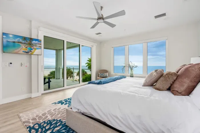 Enjoy direct balcony access and sweeping vistas from this bright, comfortable bedroom — perfect for mornings filled with sunshine.