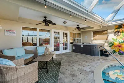 Patio furniture and hot tub.
