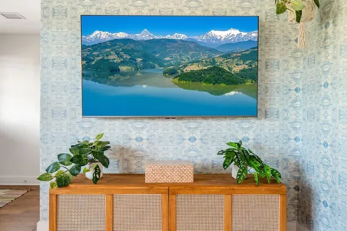 65 inch smart TV in living room.