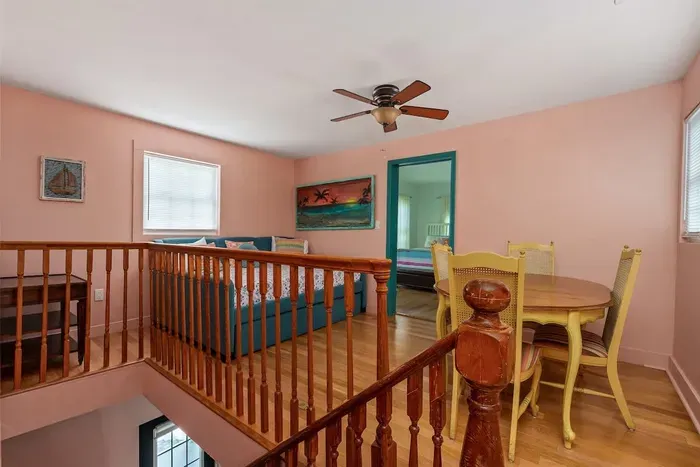 Living room with double bed and table for games
