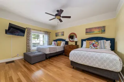 Bedroom 3 (first floor) has 2 double beds with new mattresses and a full bathroom off of it. It also has a chair/fold out bed combo for an extra sleeping option for  someone younger or smaller.