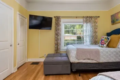 Bedroom 3 (first floor) has 2 double beds with new mattresses and a full bathroom off of it. It also has a chair/fold out bed combo for an extra sleeping option for  someone younger or smaller.