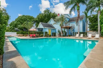 Large private, salt water pool with plenty of room to play even includes a lap lane for those wishing to exercise or stretch while on vacation.