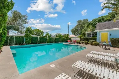 Large private, salt water pool with plenty of room to play even includes a lap lane for those wishing to exercise or stretch while on vacation.