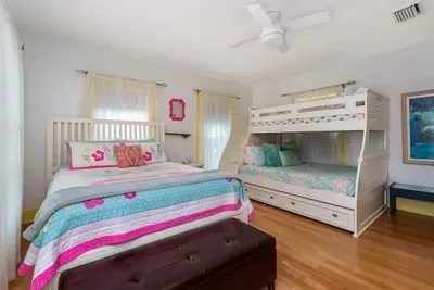 Bedroom 4 is the second bedroom upstairs and hosts the Crew's Quarters, which is a wonderful option for the kids. It has a queen bed, a twin over full bunk plus a twin trundle.