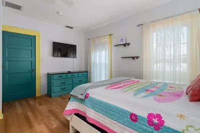 Bedroom 4 is the second bedroom upstairs and hosts the Crew's Quarters, which is a wonderful option for the kids. It has a queen bed, a twin over full bunk plus a twin trundle.