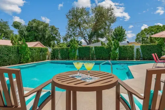Large private, salt water pool with plenty of room to play even includes a lap lane for those wishing to exercise or stretch while on vacation.