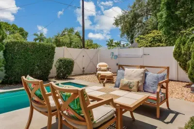 This outdoor space has ample seating for eating meals outside or simply laying & enjoying the sun.