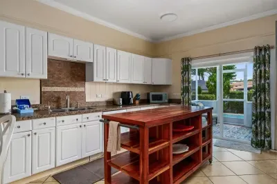 Plenty of cabinet space and room under the large island for all of your food and snacks.