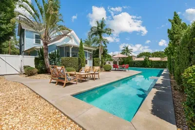 Large private, salt water pool with plenty of room to play even includes a lap lane for those wishing to exercise or stretch while on vacation.
