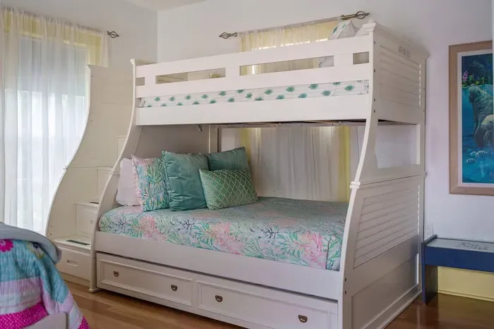 Bedroom 4 is the second bedroom upstairs and hosts the Crew's Quarters, which is a wonderful option for the kids. It has a queen bed, a twin over full bunk plus a twin trundle.