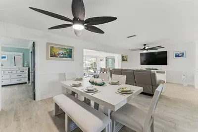 This charming dining area offers the perfect setting for meals, with stunning views that elevate every dining experience. Perfect for enjoying a peaceful breakfast or an evening gathering.
