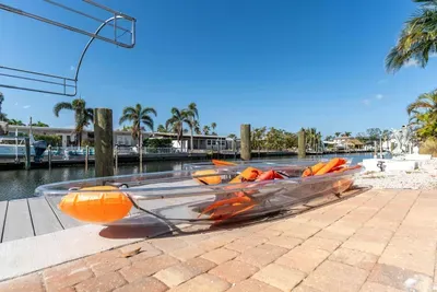 Glide through calm waters with direct canal access and stunning view perfect for nature lovers and outdoor explorers.