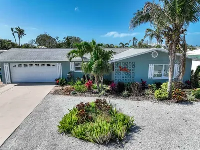 From the moment you arrive, the inviting front view of this home greets you with warmth and charm. With lush landscaping, a beautiful entrance, and a cozy vibe, this is the perfect start to your stay.