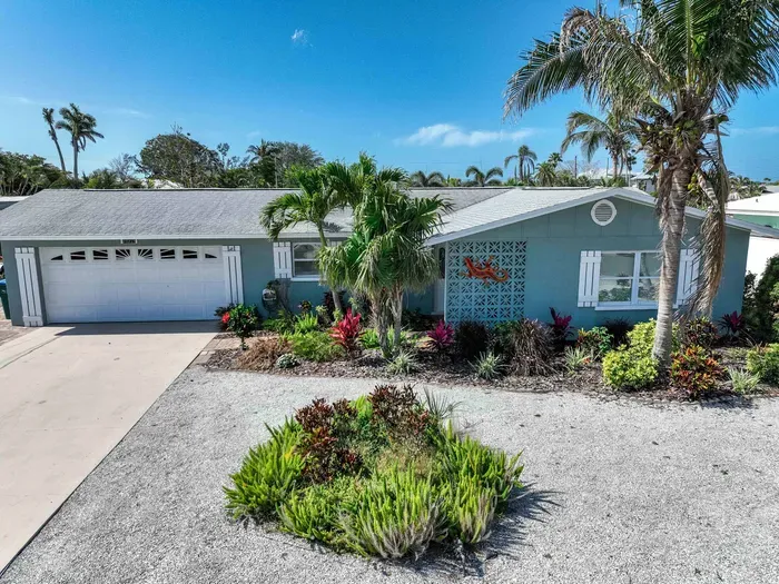 From the moment you arrive, the inviting front view of this home greets you with warmth and charm. With lush landscaping, a beautiful entrance, and a cozy vibe, this is the perfect start to your stay.