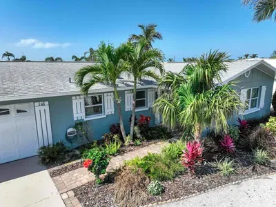 Step into vacation mode with this beautifully maintained front entrance, offering peaceful vibes and welcoming charm from the very start.