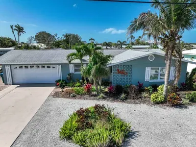 Pull up to comfort and style this inviting front exterior sets the perfect tone for your stay, with charming curb appeal and a warm, welcoming vibe.