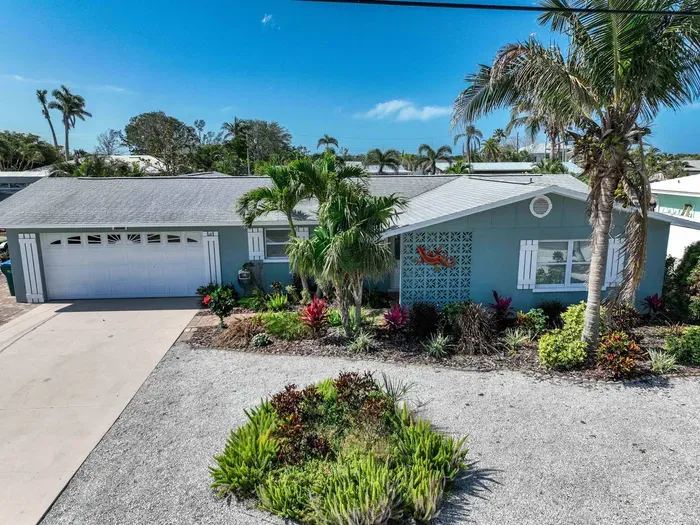 Pull up to comfort and style this inviting front exterior sets the perfect tone for your stay, with charming curb appeal and a warm, welcoming vibe.