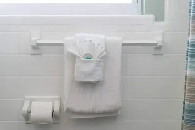 Indulge in the comfort of fresh, fluffy towels, designed to elevate your bathroom experience. Soft, absorbent, and always ready to make you feel pampered.