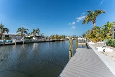 Step outside to your private paradise with direct canal access and breathtaking views. Perfect for kayaking, fishing, or simply soaking in the beauty of nature right from your doorstep.