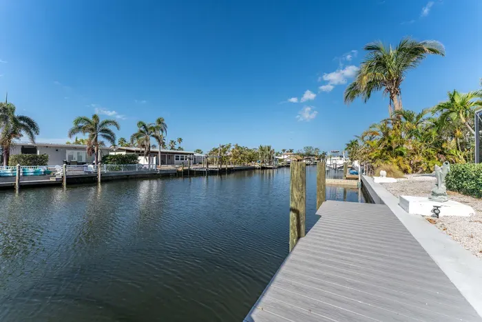 Step outside to your private paradise with direct canal access and breathtaking views. Perfect for kayaking, fishing, or simply soaking in the beauty of nature right from your doorstep.