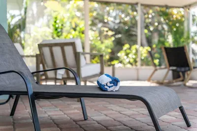 Unwind in style with this comfortable pool chair, perfect for lounging by the water. Whether you're soaking up the sun or enjoying a cool drink, this chair offers the ideal spot for ultimate relaxation.