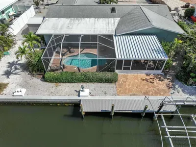 Step outside to your private backyard oasis with stunning views of the tranquil canal. Whether you're lounging on the patio, enjoying the fresh air, or watching the gentle flow of the water, this peaceful spot offers the perfect for relaxatiion.