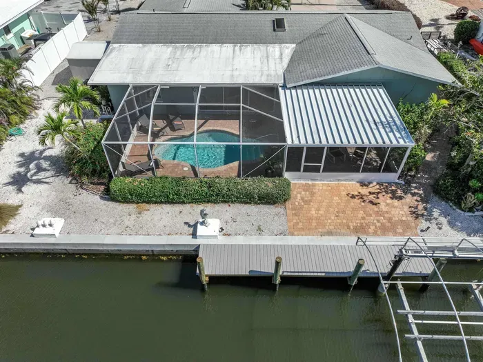 Step outside to your private backyard oasis with stunning views of the tranquil canal. Whether you're lounging on the patio, enjoying the fresh air, or watching the gentle flow of the water, this peaceful spot offers the perfect for relaxatiion.