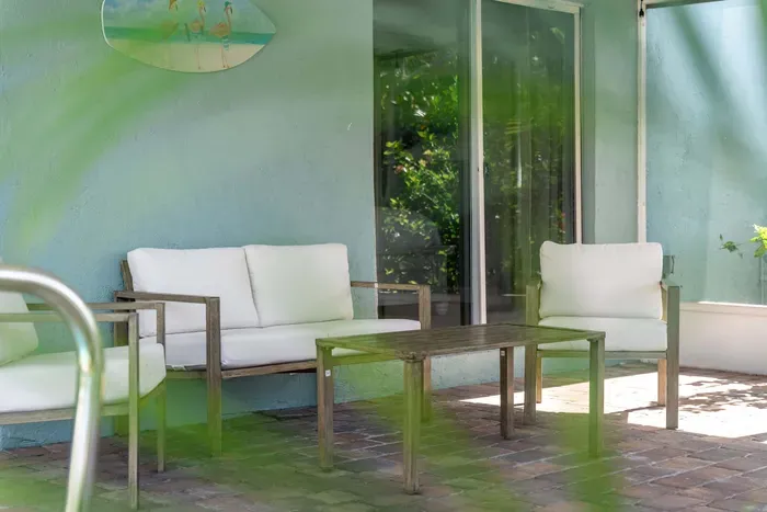 Unwind in comfort on this inviting outdoor patio, designed for both relaxation and entertaining, with plenty of space to enjoy the outdoors in style.