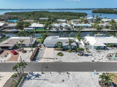 Take in the spacious front view of this charming home, perfectly situated on a peaceful street. The wide perspective showcases the beauty of the surroundings, offering a serene yet welcoming atmosphere.