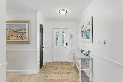 Enter through this charming hallway that immediately makes you feel at home. Thoughtfully designed, it offers a spacious and cozy introduction to the rest of your stay.