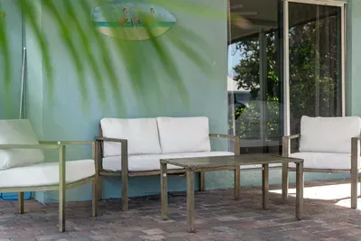 Step outside and embrace the beauty of your surroundings on this inviting outdoor patio. Perfect for morning coffee, afternoon relaxation, or evening stargazing, this space offers comfortable seating, cozy ambiance, and a peaceful atmosphere.