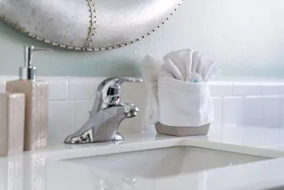 This sleek and stylish vanity faucet combines modern design with functionality, creating a luxurious and practical touch for your bathroom experience.