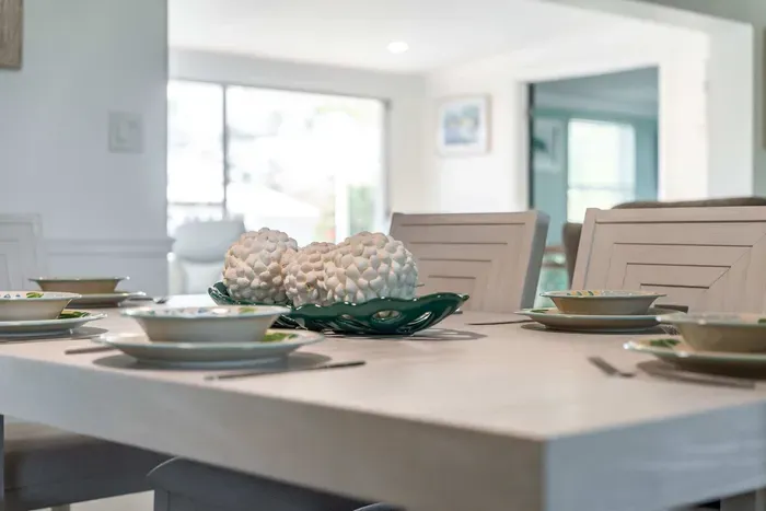 Enjoy meals in style at this elegant dining table, perfect for family gatherings or intimate meals. The spacious dining area creates a warm and inviting atmosphere for every occasion.