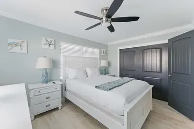 Settle into this charming room featuring a comfy twin bed, a spacious side cabinet for all your essentials, and a ceiling fan to keep the air crisp and cool.