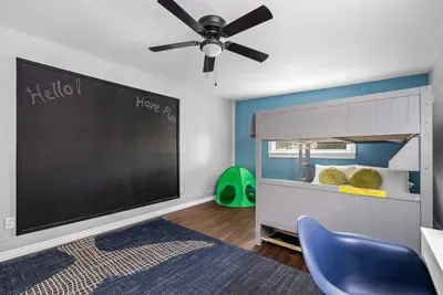 Fifth bedroom with working space (includes full size bunk beds and twin size trundle bed)