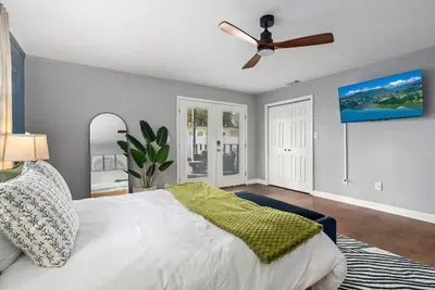 Master bedroom with Queen bed and TV