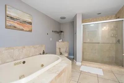 Ensuite bathroom connected to primary bedroom
