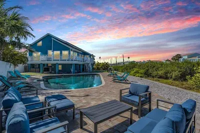 Coastal paradise awaits! Stunning beachside retreat featuring a sparkling pool, spacious outdoor lounge, and breathtaking sunset views. Perfect blend of luxury & relaxation your dream getaway starts here!