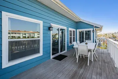 Dine al fresco on the spacious balcony with seating for six and stunning water views. Perfect for morning coffee, sunset dinners, or simply soaking up the fresh coastal breeze in your own private retreat.